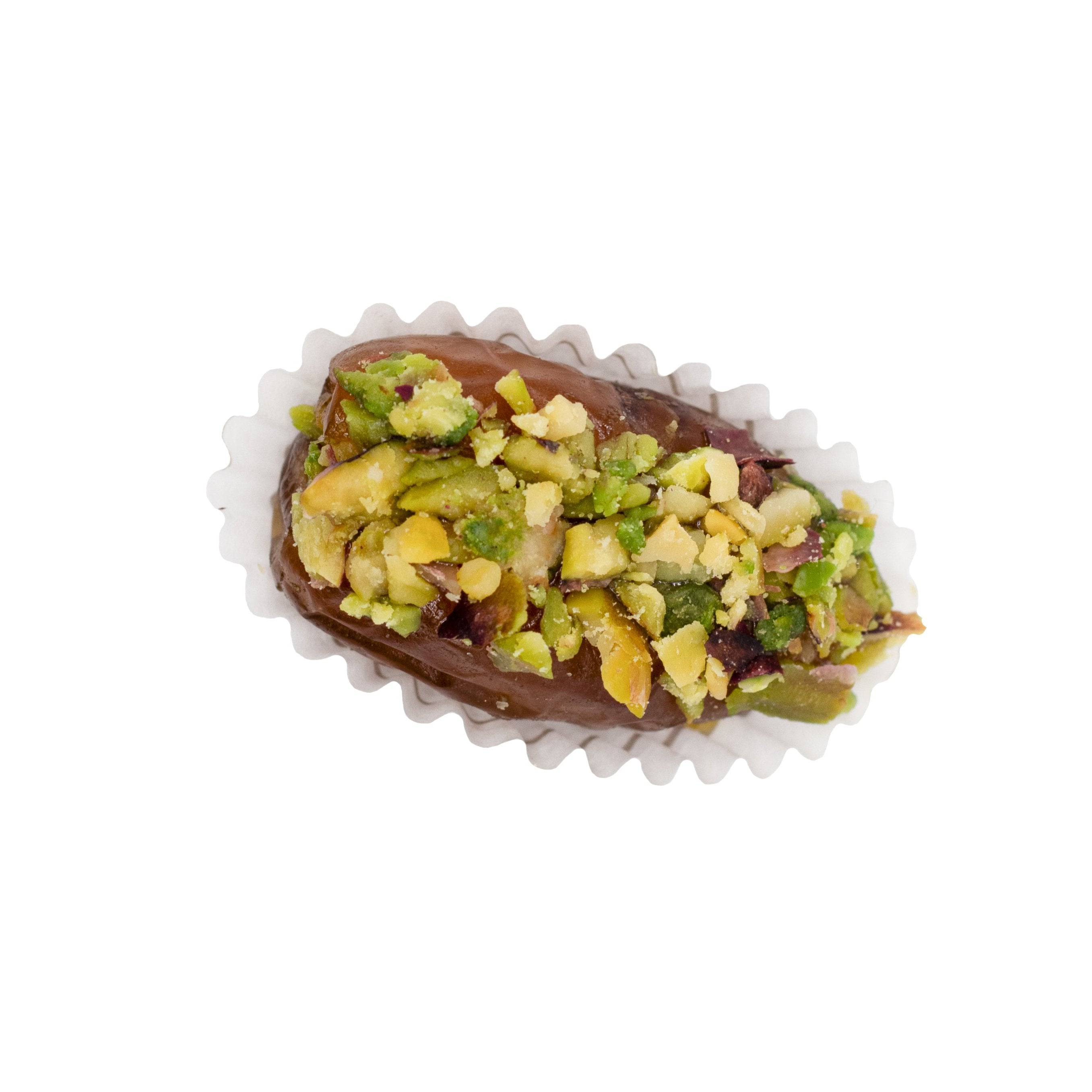 Datte farcie à la pâte d'amandes et noisettes, garnie de pistaches concassées