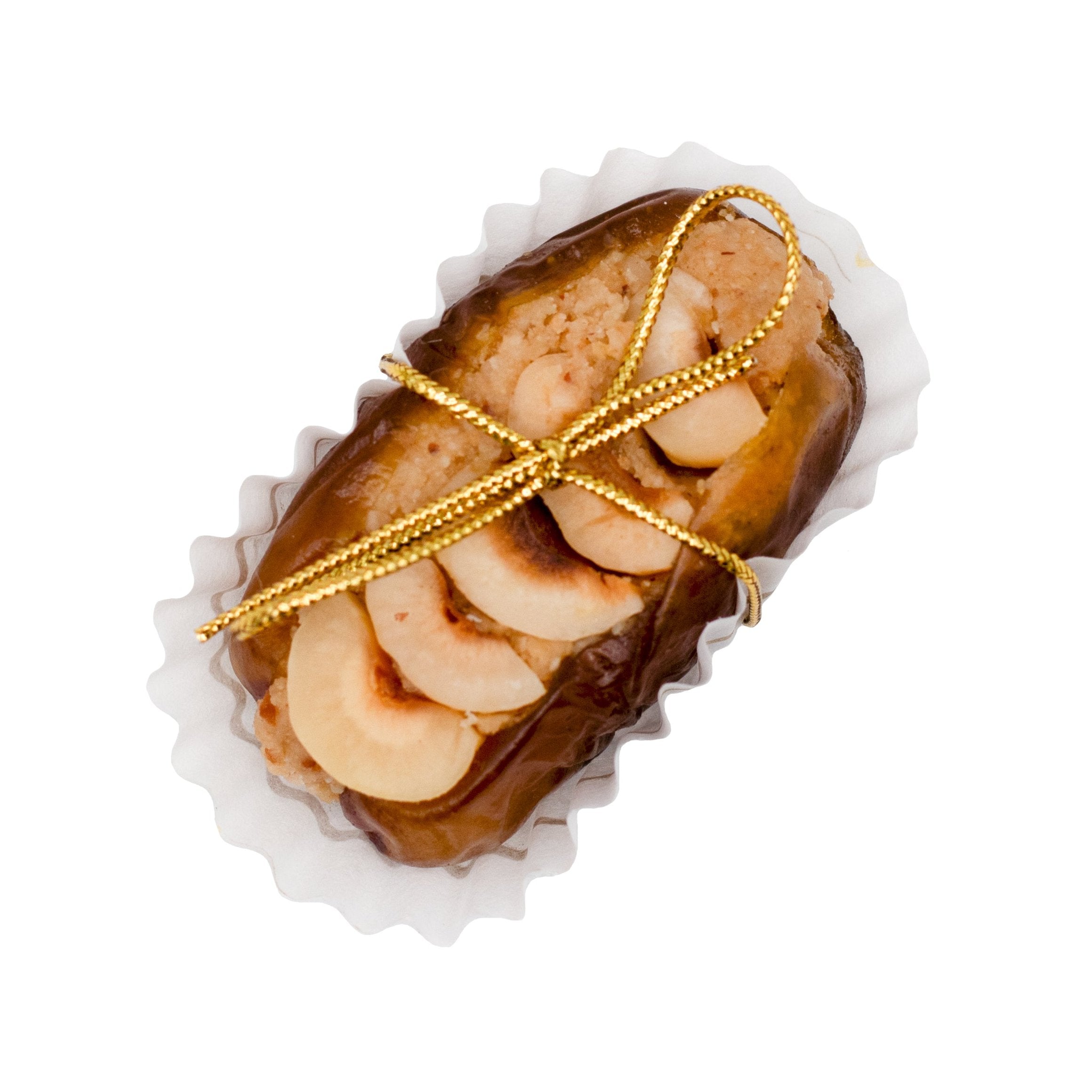 Datte Prestige Noisette avec tranches de noisettes et fil doré, élégance et raffinement